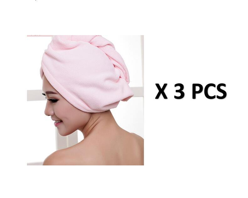 Set of three pink women's hair drying towel wraps for quick and gentle hair drying