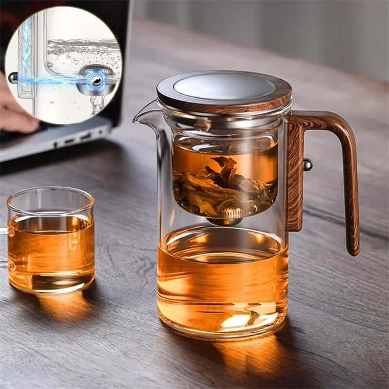 Shopi Vella wood handle tea separation pot glass infuser with brewed tea on wooden table
