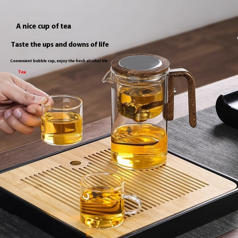 Shopi Vella wood handle tea separation pot with clear glass and two cups on bamboo tea tray for kitchen storage