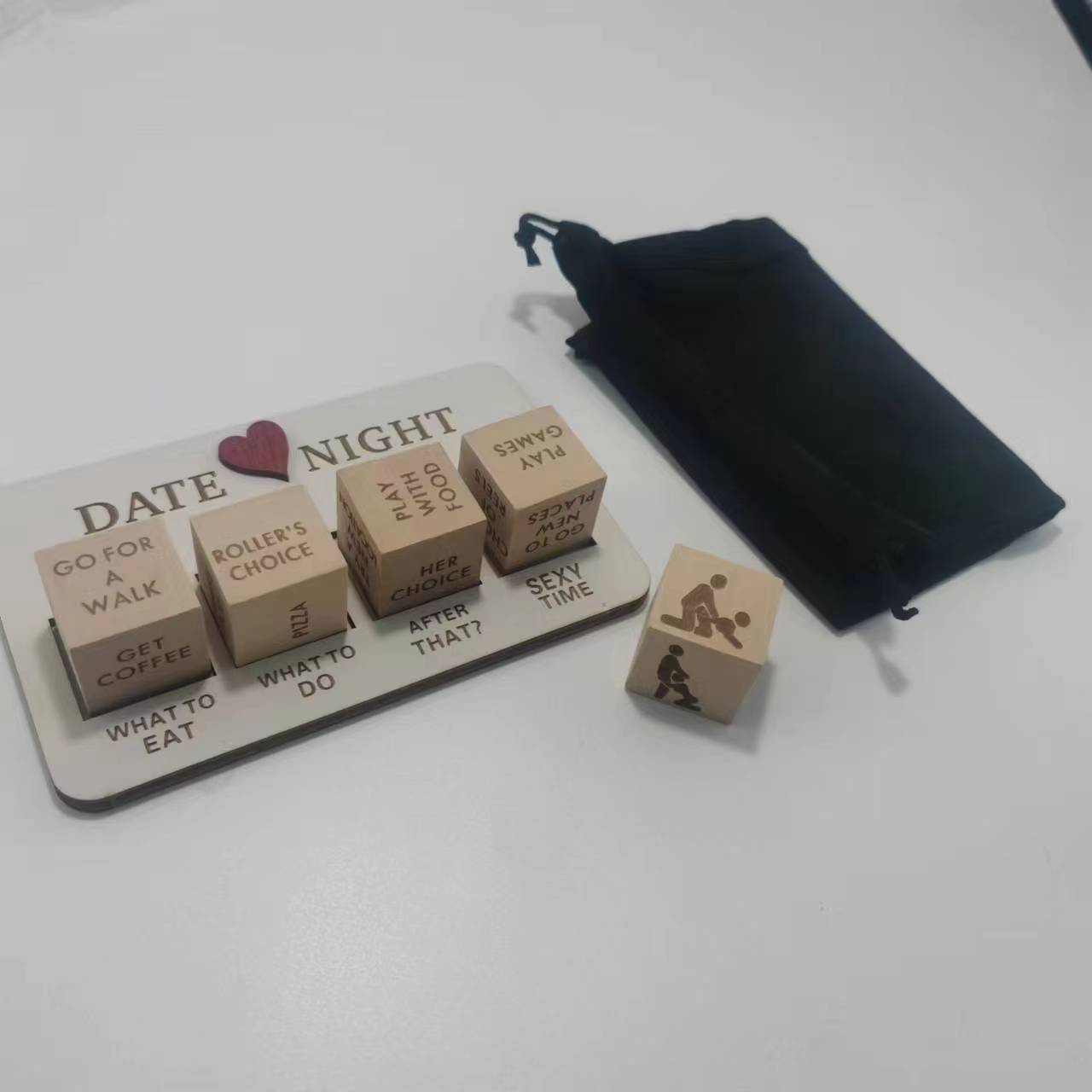 Wooden date night dice game set with engraved cubes and black storage pouch by Shopi Vella