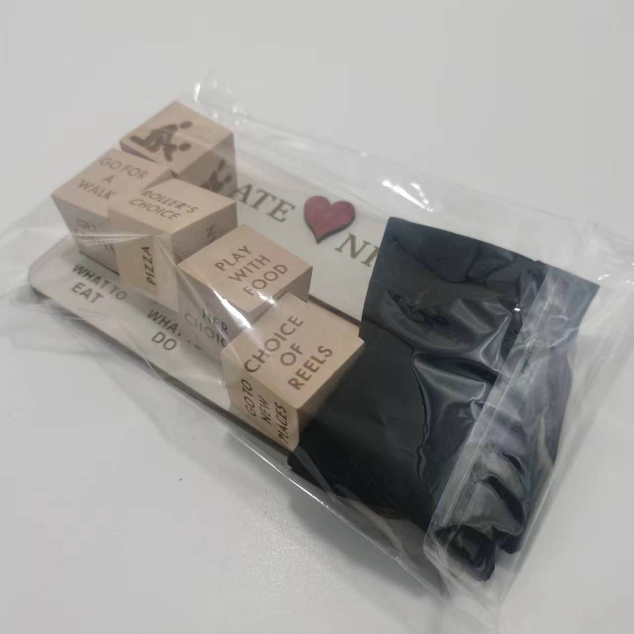 Shopi Vella wooden date night dice game with engraved wooden blocks and storage pouch