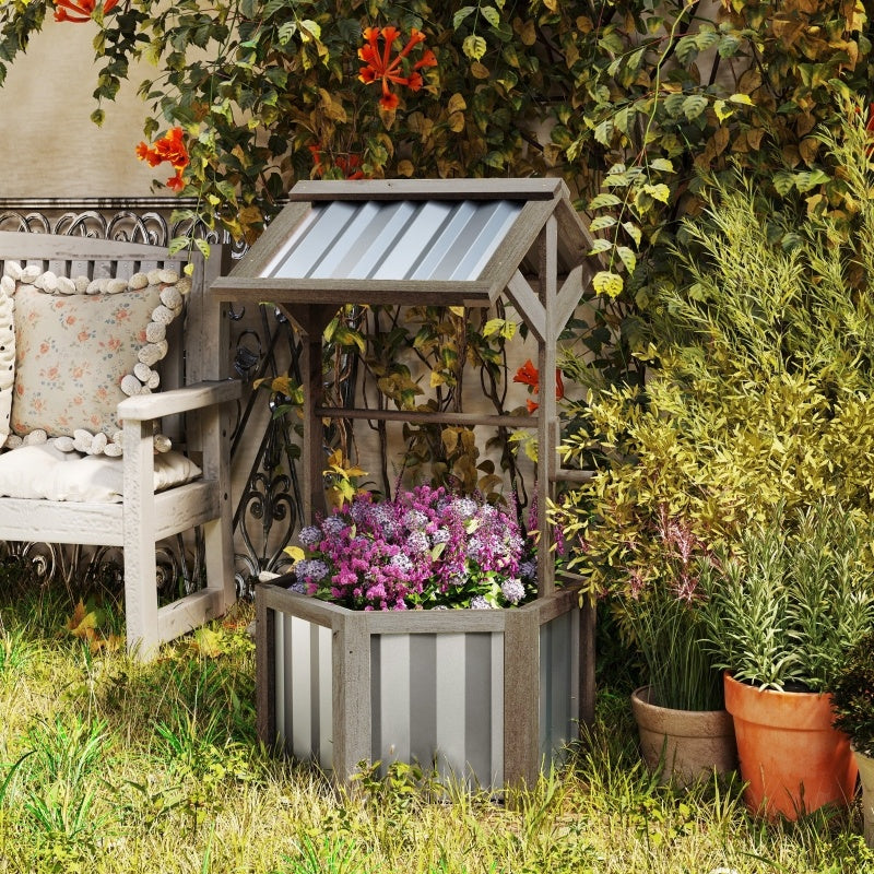 Shopi Vella wooden wishing well planter with vibrant flowers in an outdoor garden setting