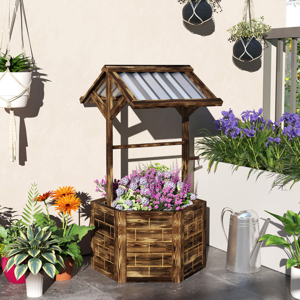 Shopi Vella wooden wishing well planter filled with flowers for outdoor garden decoration